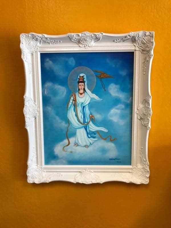 Guan Yin Buddha Holds a Yellow Strand, painting by Hang Pham